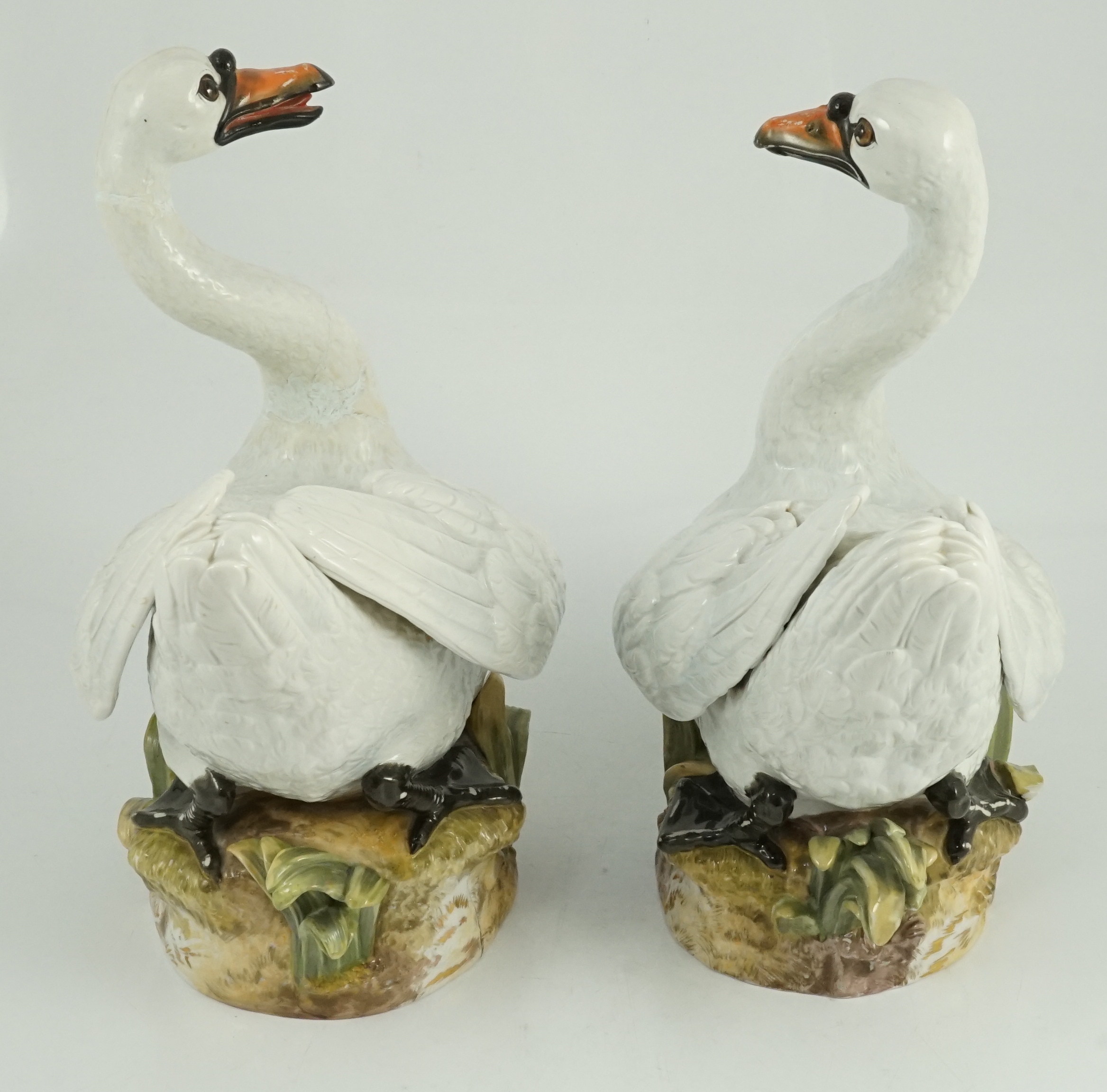 A pair of large Meissen models of swans, 19th century, one neck restored